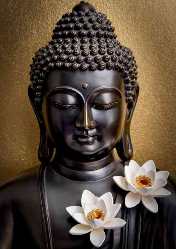 Statue of buddha with gold background