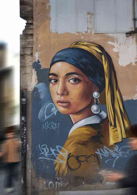 Street mural of a woman s portrait