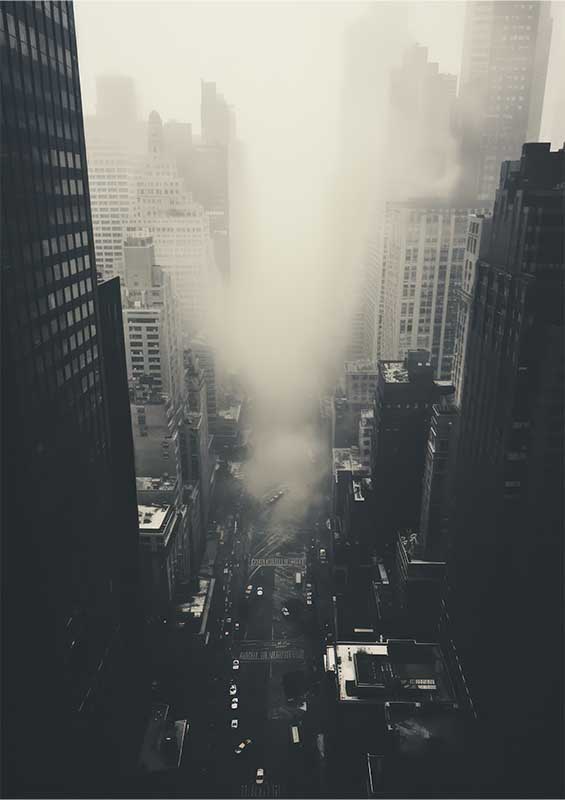 Towering skyscrapers with mist in a city