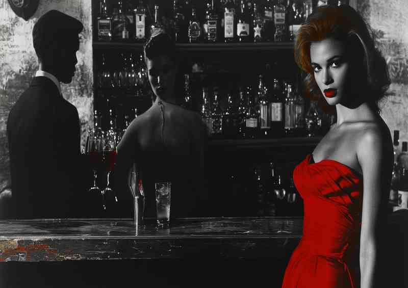 Lady in red having cocktails